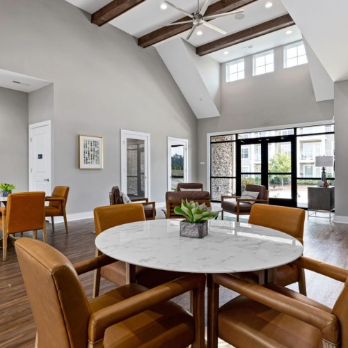 a room with a table and chairs