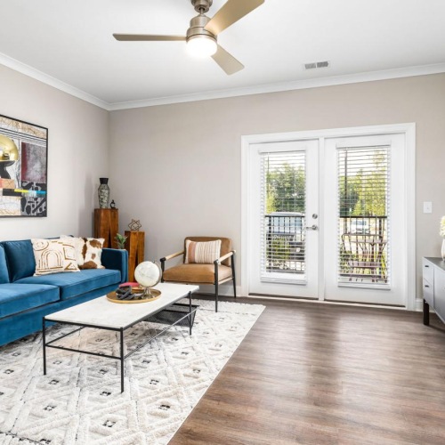 a living room with a blue couch